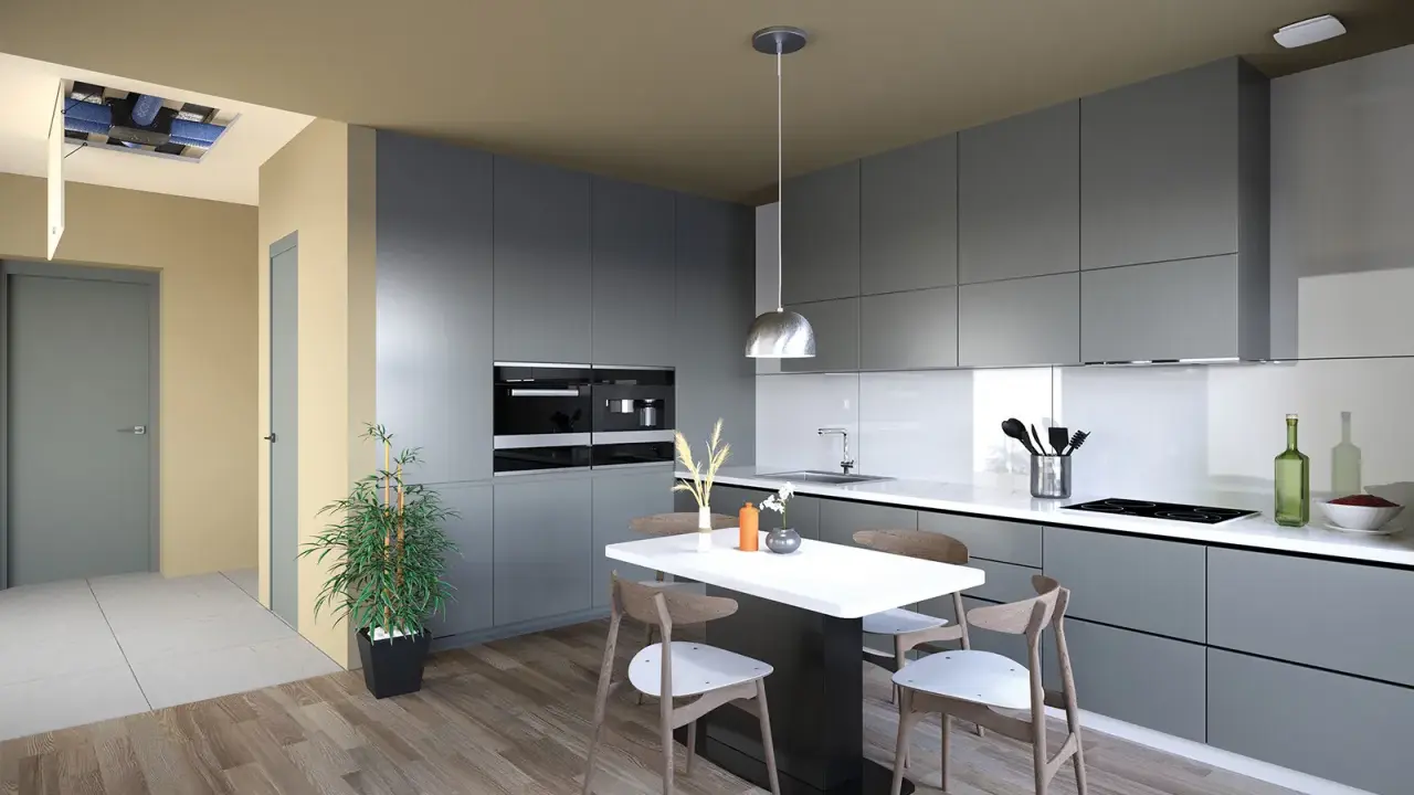 Cuisine moderne avec îlot central. Un système hygro A ou B est visible au plafond, assurant une ventilation optimale.