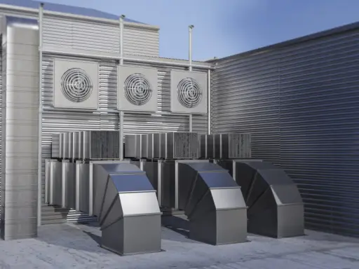 Système de ventilation extérieure avec plusieurs ventilateurs et conduits métalliques. Ce système pourrait être une VMC hygroréglable ou autoréglable pour un bâtiment.